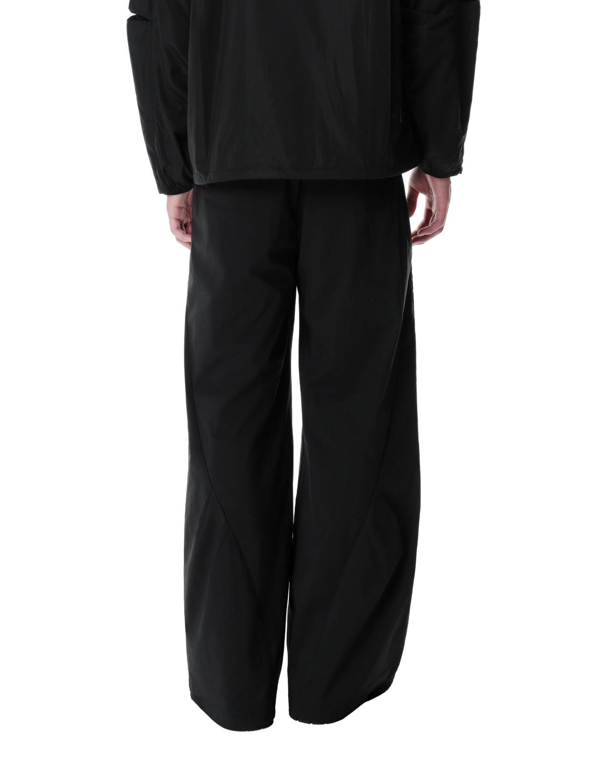 Osse Technical Pants in Black, back view on model