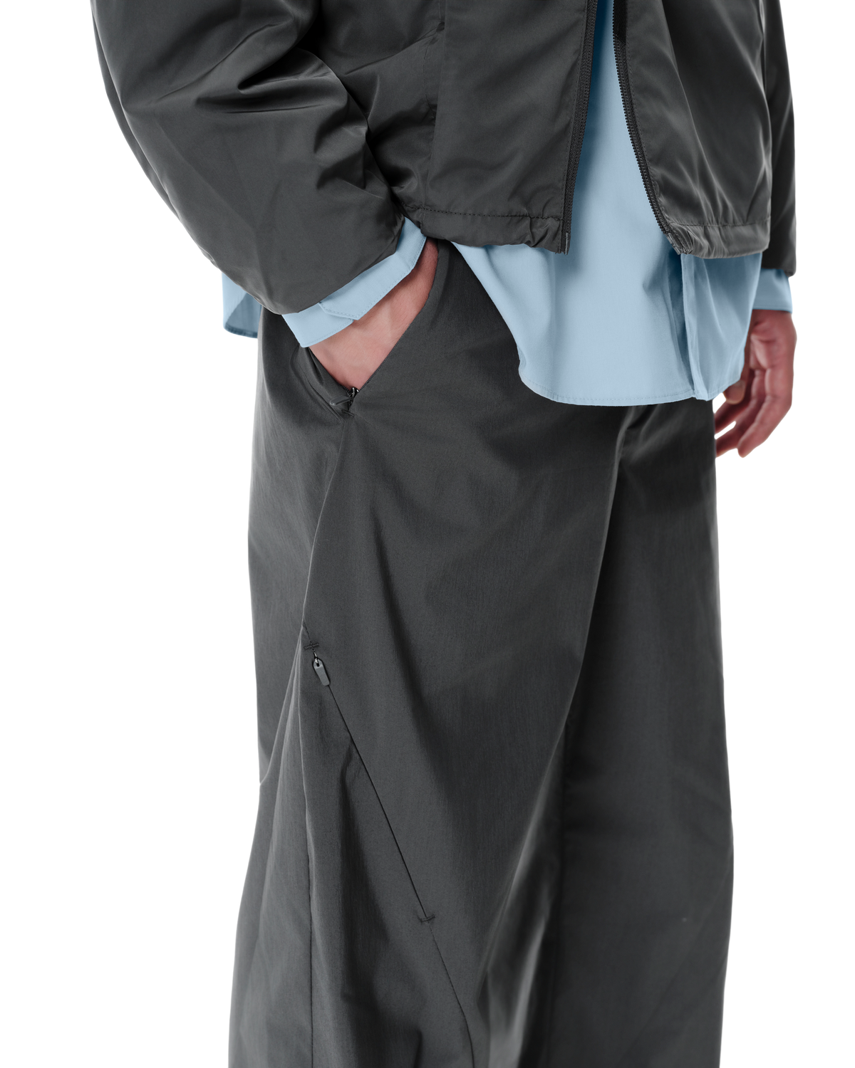 Osse Technical Pants in Grey, detail view on model