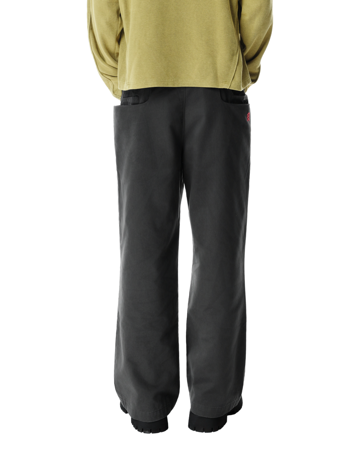 Ryg Pleated Trousers in Washed Grey, back view on model