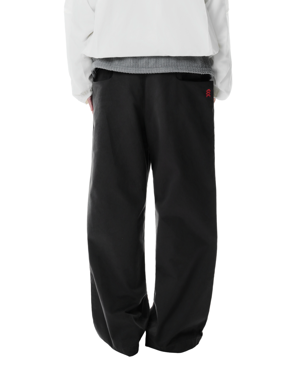 Ryg Pleated Trousers in Washed Grey, back view on model