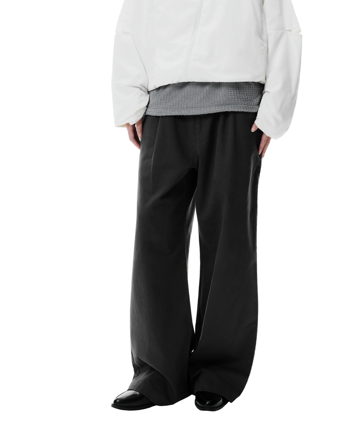Ryg Pleated Trousers in Washed Grey, front view on model
