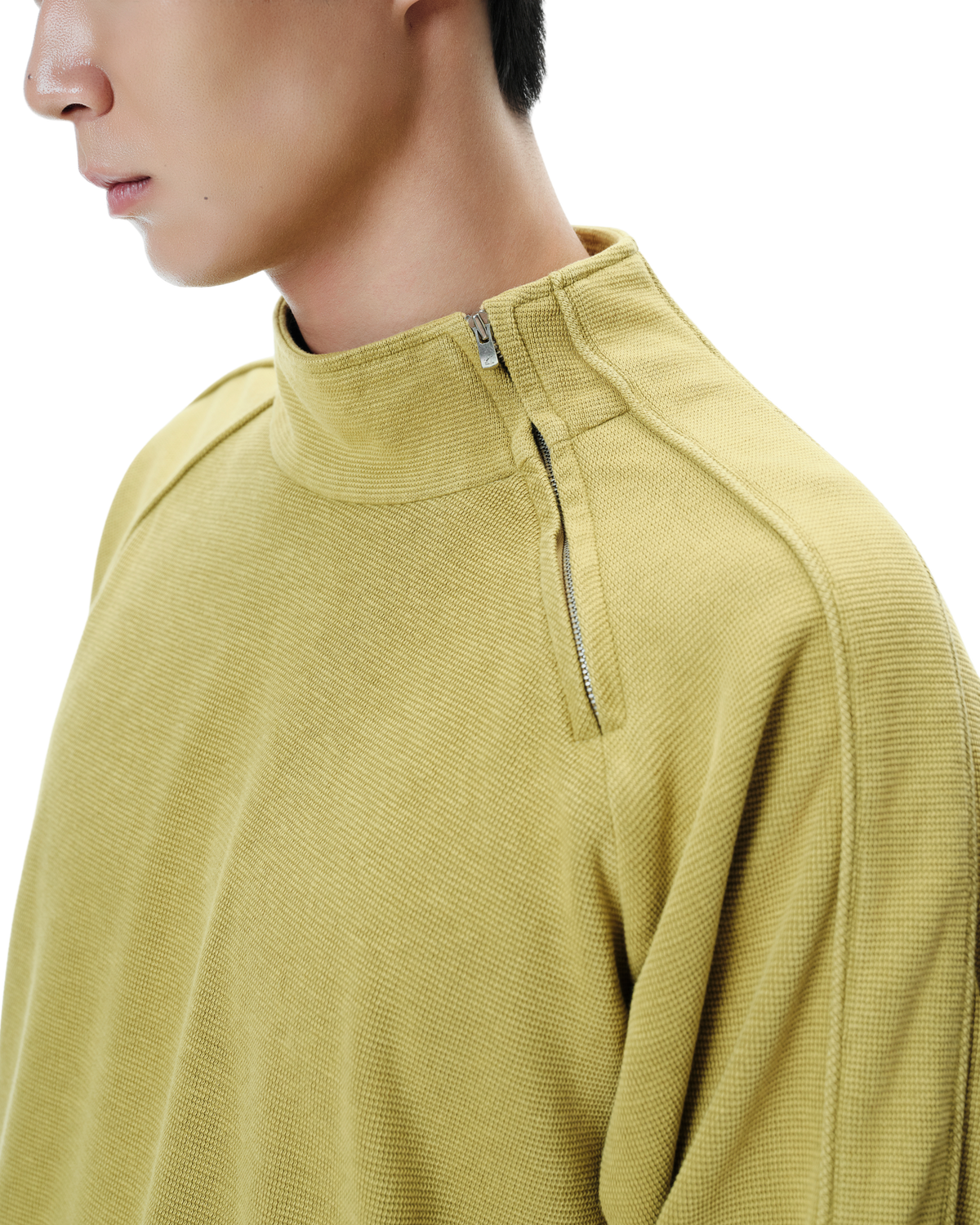 Talus Half-Zip Pullover in Lichen Yellow, detail view on model