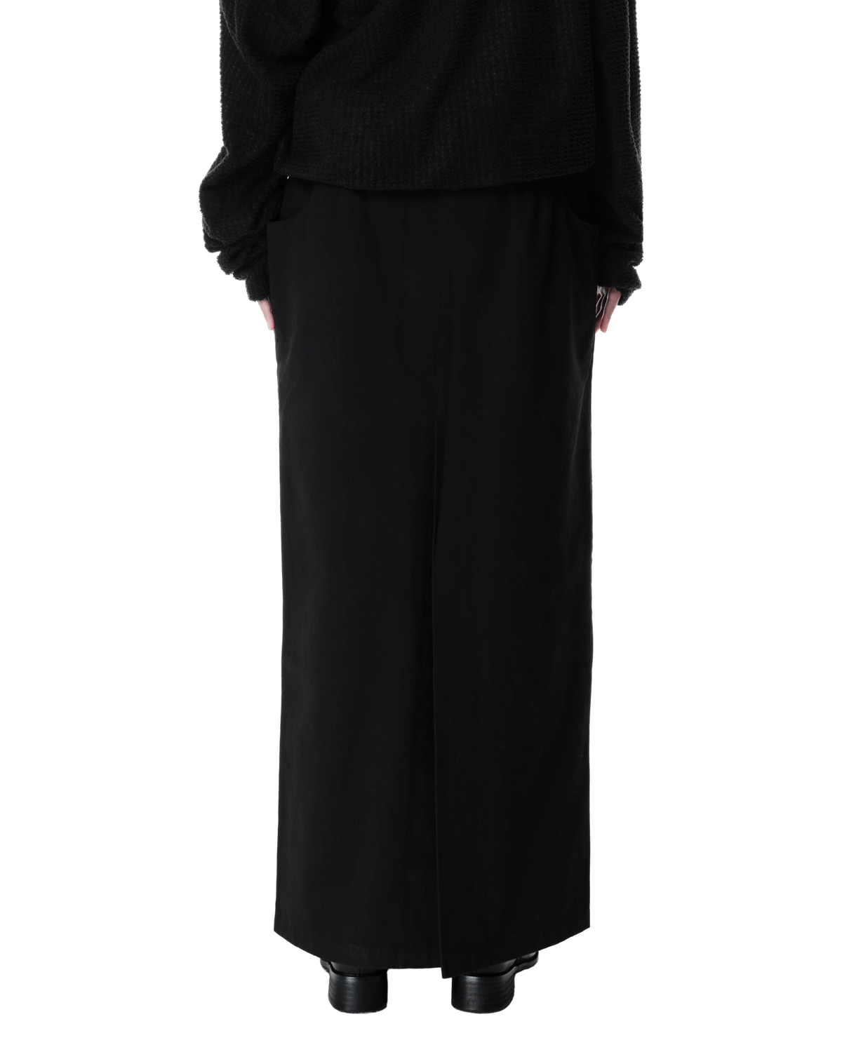 Vea Column Skirt in Black, back view on model