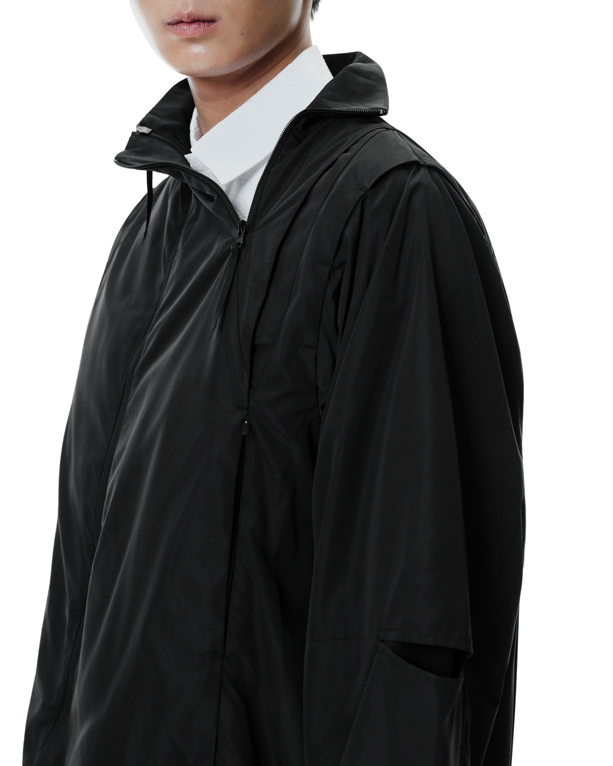 Vex Windbreaker in Black, detail view on model