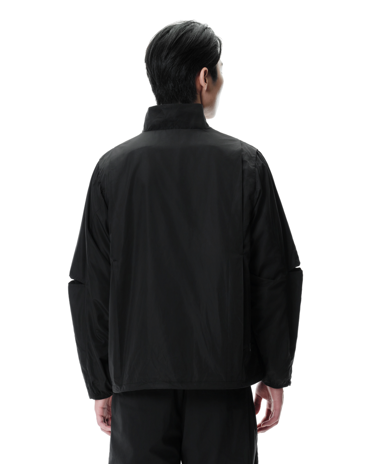 Vex Windbreaker in Black, back view on model